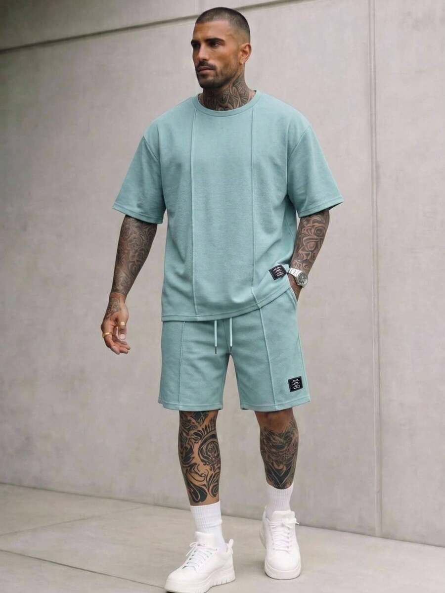 HIMLAND Men's Solid Color Plant Print Crew Neck Short Sleeve T-Shirt And Drawstring Waist Pocket Shorts Set